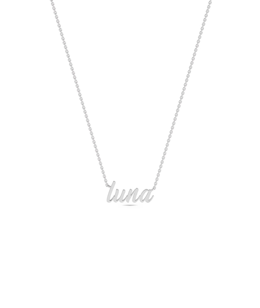 Custom White Gold Name Necklace worn on neckline highlighting personalized nameplate styling