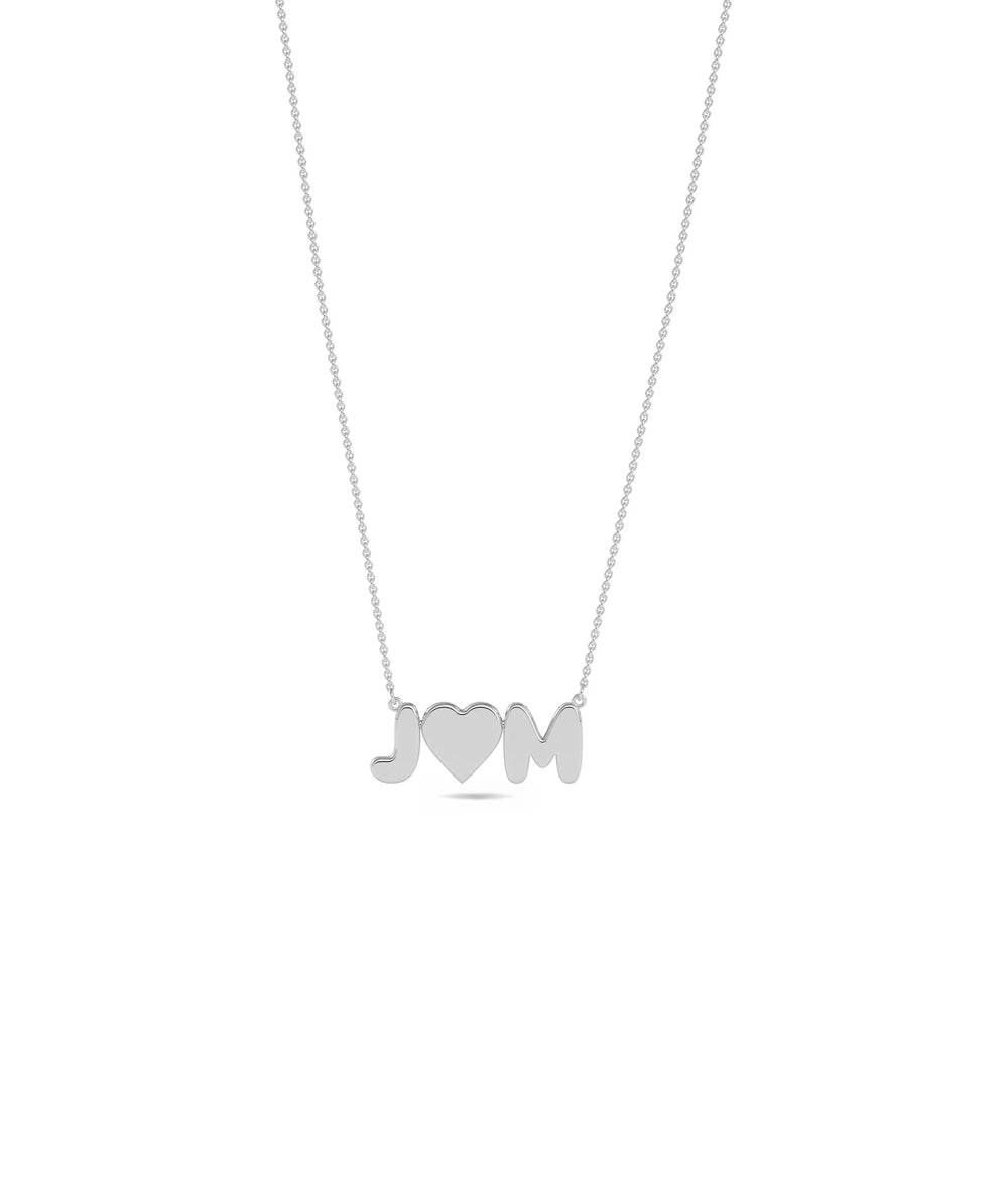 Custom Initial and Heart Necklace in white gold featuring dual-charm personalized design
