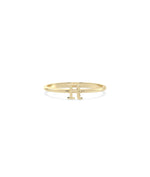 Custom Gold Initial Band Ring on display highlighting must-have meaningful appeal