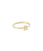 Unique initial ring profile displaying elegant letter sizing and band proportions
