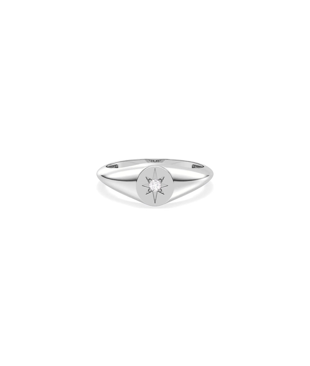 Diamond Star Burst Signet Ring in white gold featuring celestial starburst with diamonds