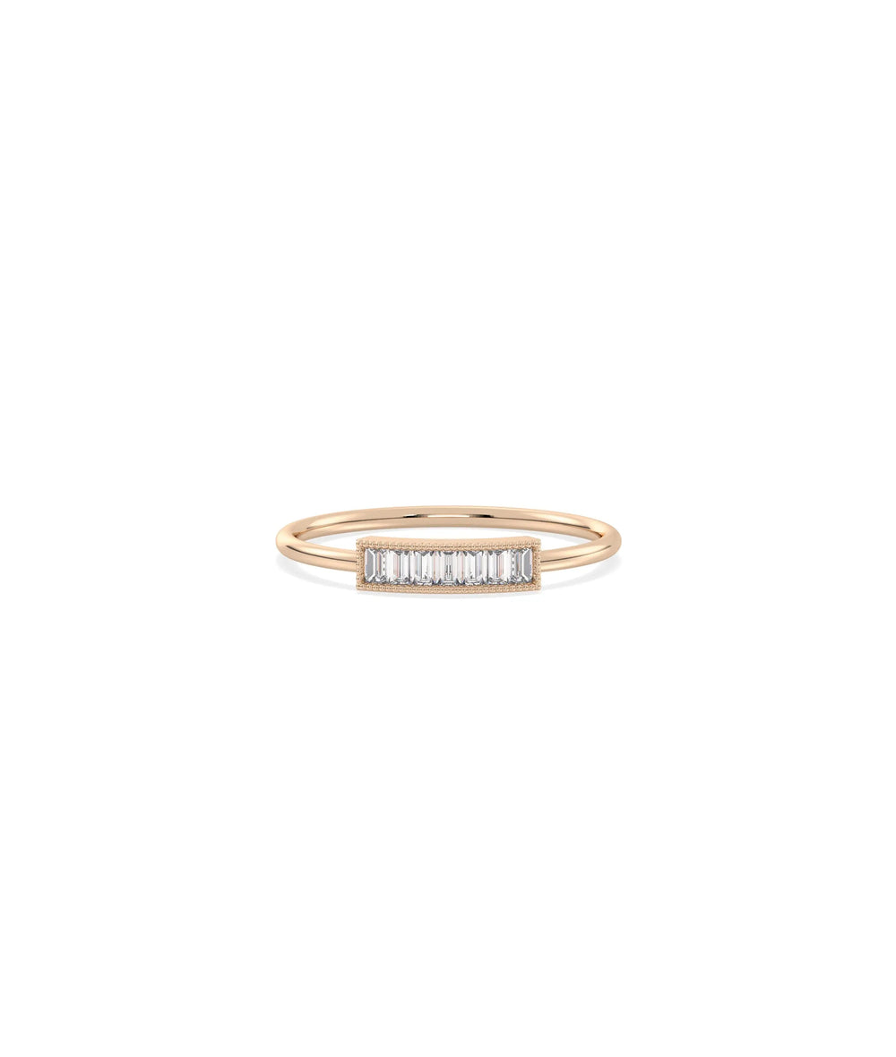 Rose gold channel band ring featuring precision-aligned baguette diamonds
