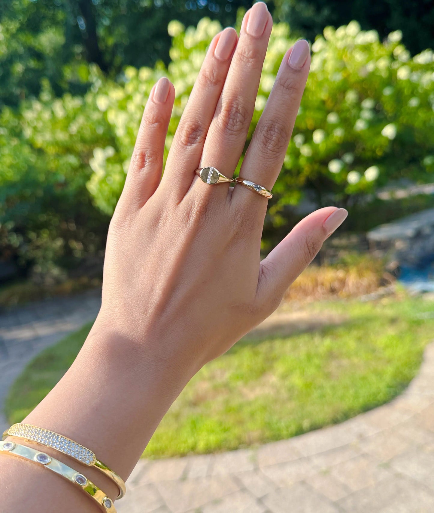 Closeup of Diamond Straight Line Circle Signet Band Ring showing straight diamond line detail