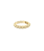 Twist band ring side view displaying dimensional sculptural twist pattern