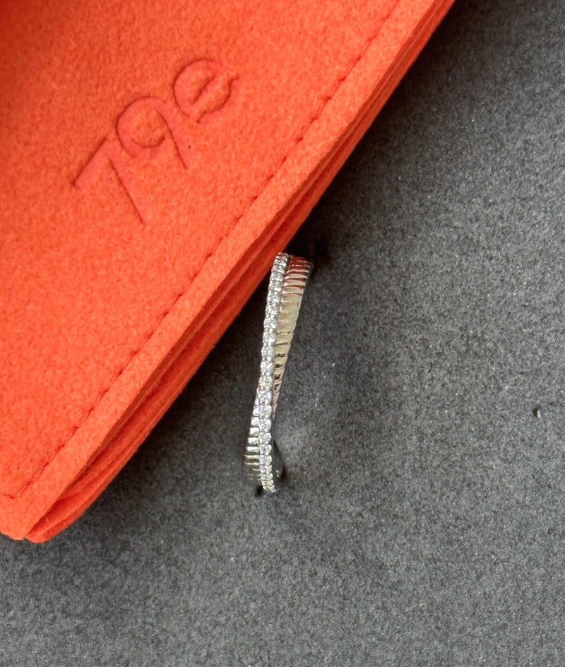 Diamond Line and Fluted Gold Band Ring on hand displaying diamond and fluted styling