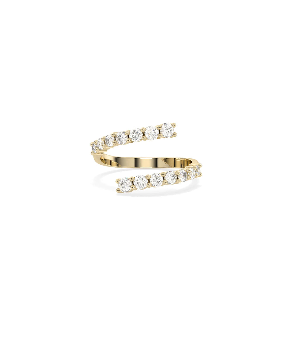 Diamond Bypass Ring in yellow gold with crossing bands and abundant diamonds