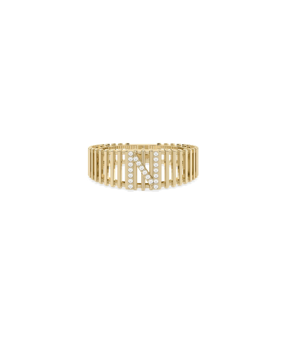 Custom Diamond Initial Band Ring in yellow gold with personalized diamond initial