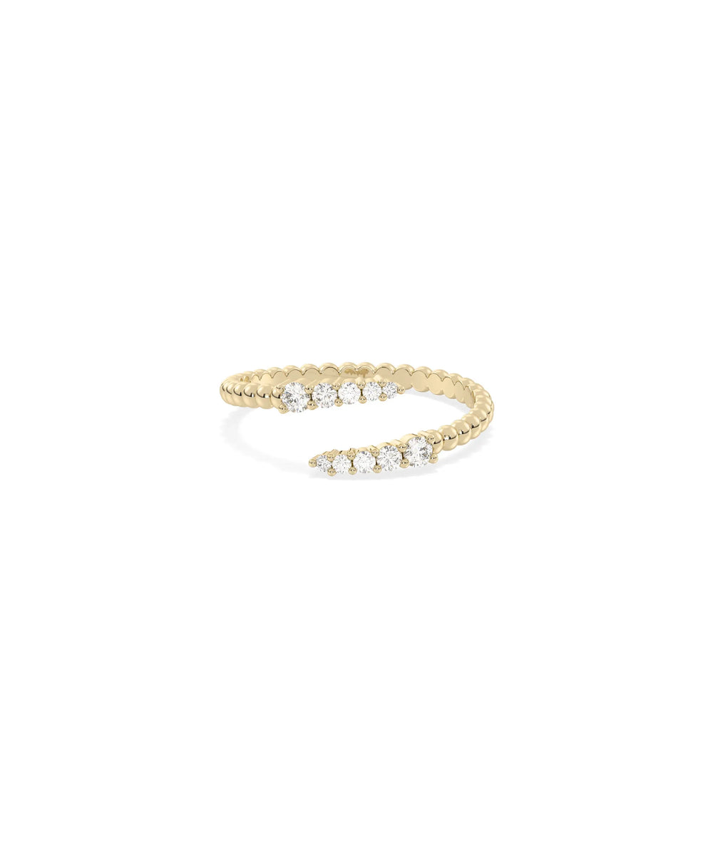Beaded Gold and Diamond Bypass Ring in yellow gold with textured beading