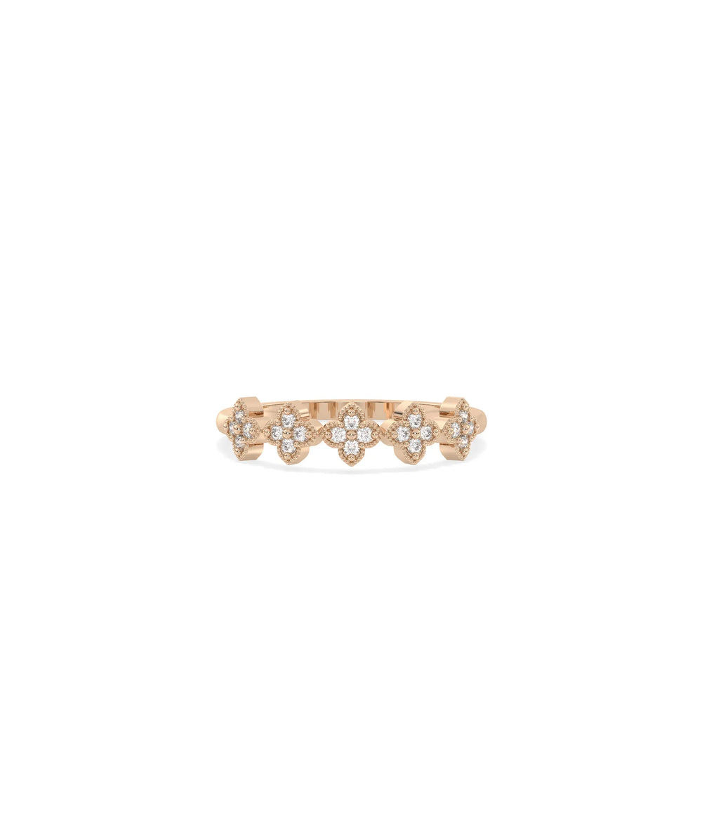 Rose gold clover ring featuring timeless four-leaf design with diamonds