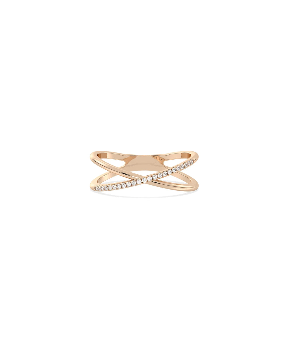 Rose gold criss cross ring featuring bold intersecting bands with diamonds