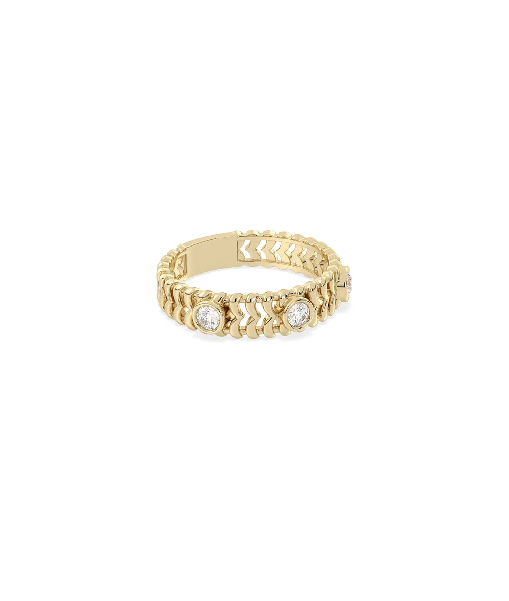 Chevron band ring side view displaying bezel stations and 4mm width geometric design