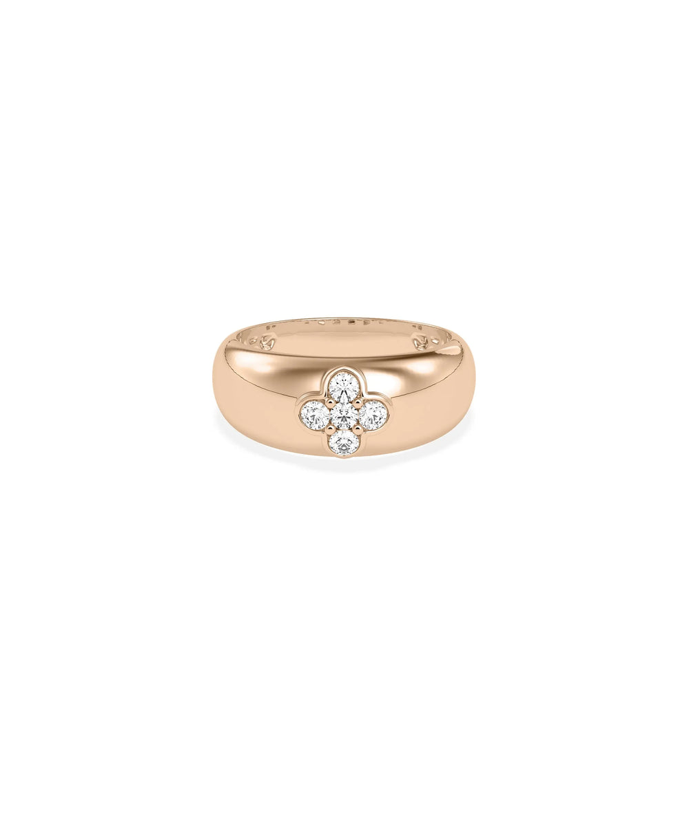 Rose gold clover ring featuring dome shape and clustered diamond petals