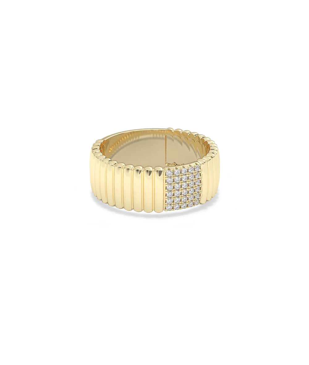 Cluster fluted band ring side profile displaying diamond groups and textured details