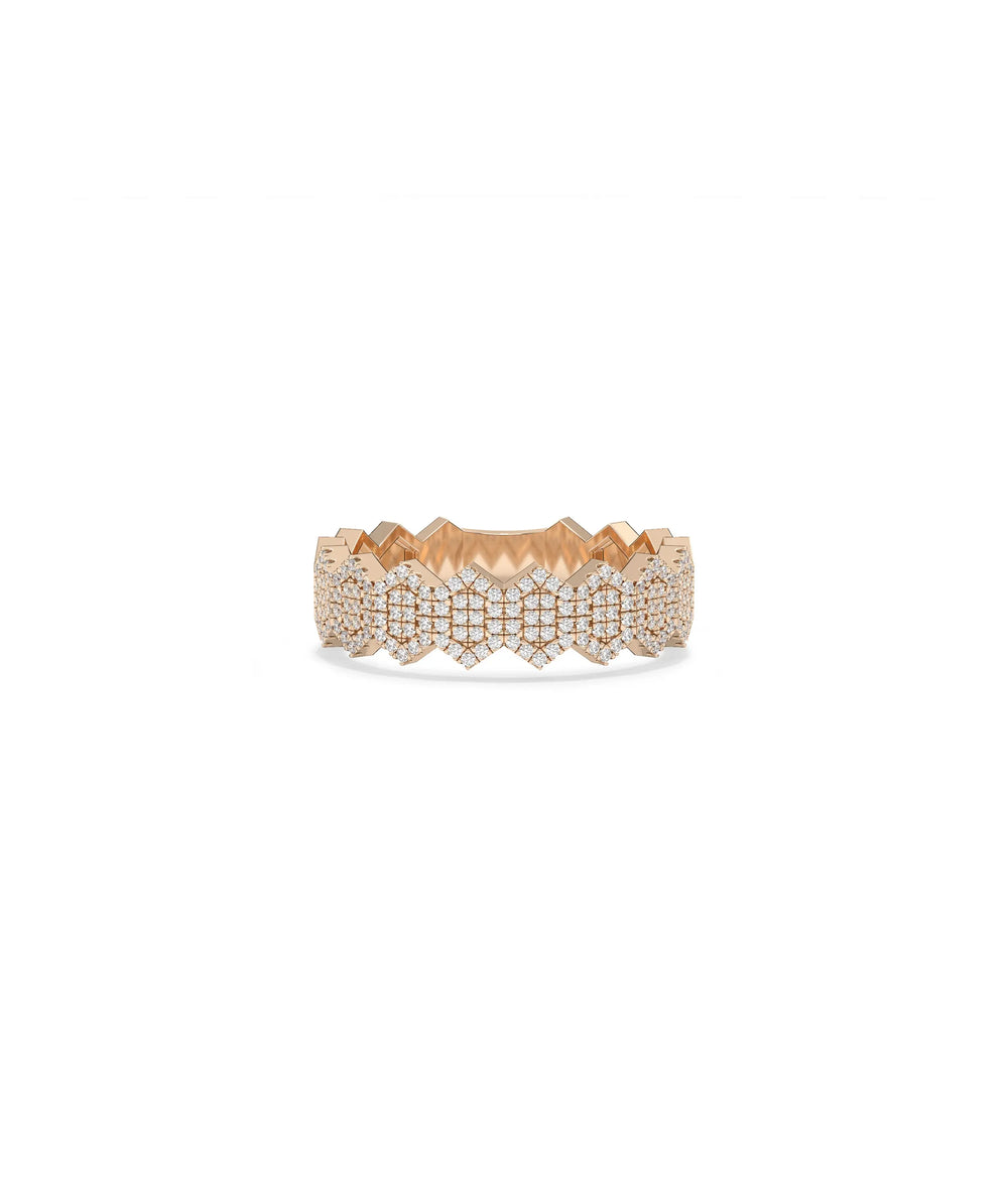 Rose gold geometric ring featuring modern angular diamond pattern design