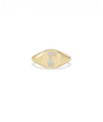 Custom Diamond Pave Initial Signet Ring on hand displaying modern signet styling