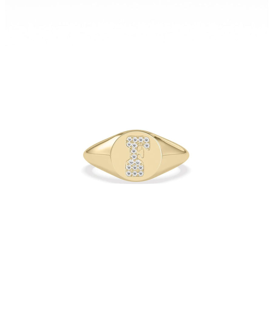 Custom Diamond Pave Initial Signet Ring on hand displaying modern signet styling
