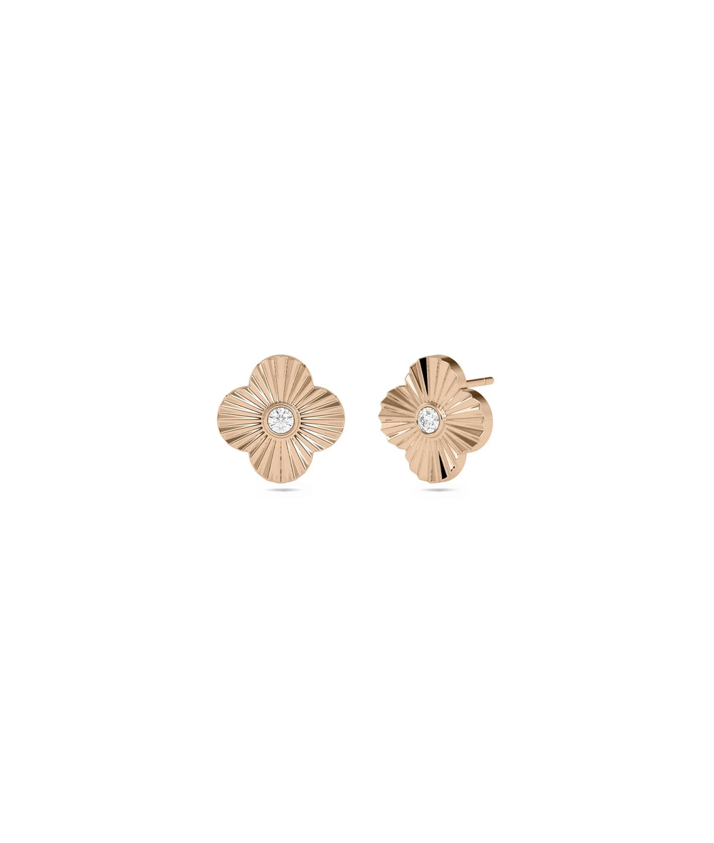 Rose gold clover studs featuring botanical design with dazzling center diamond