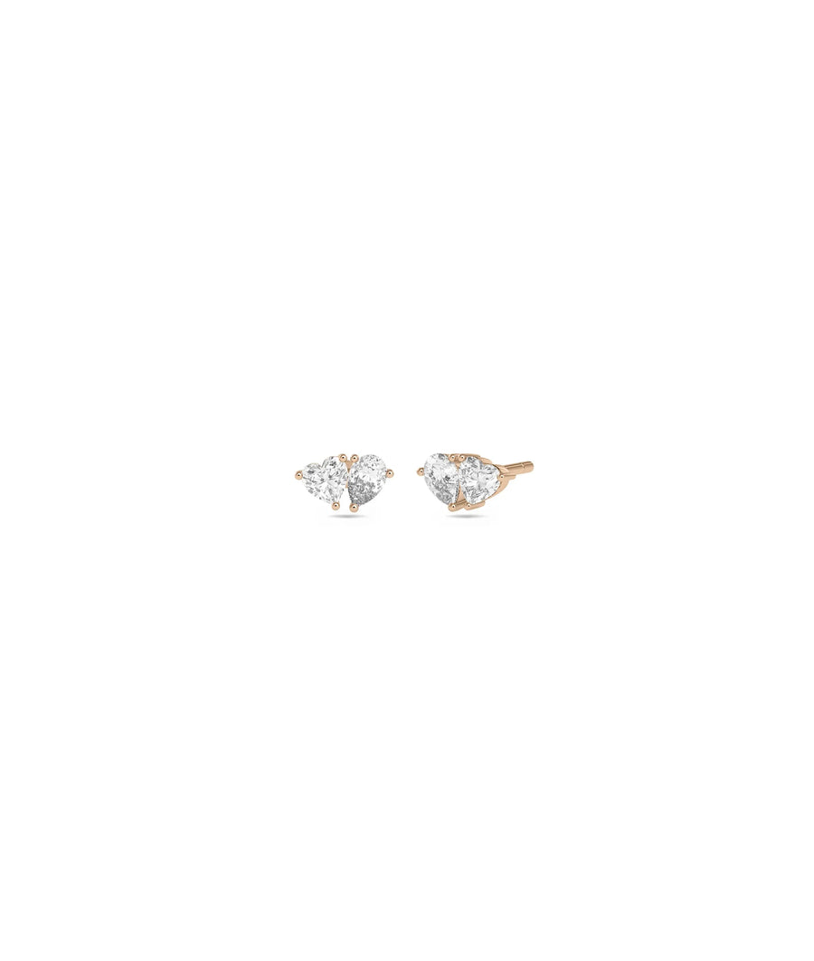 Rose gold diamond studs featuring two brilliant stones per earring sparkle