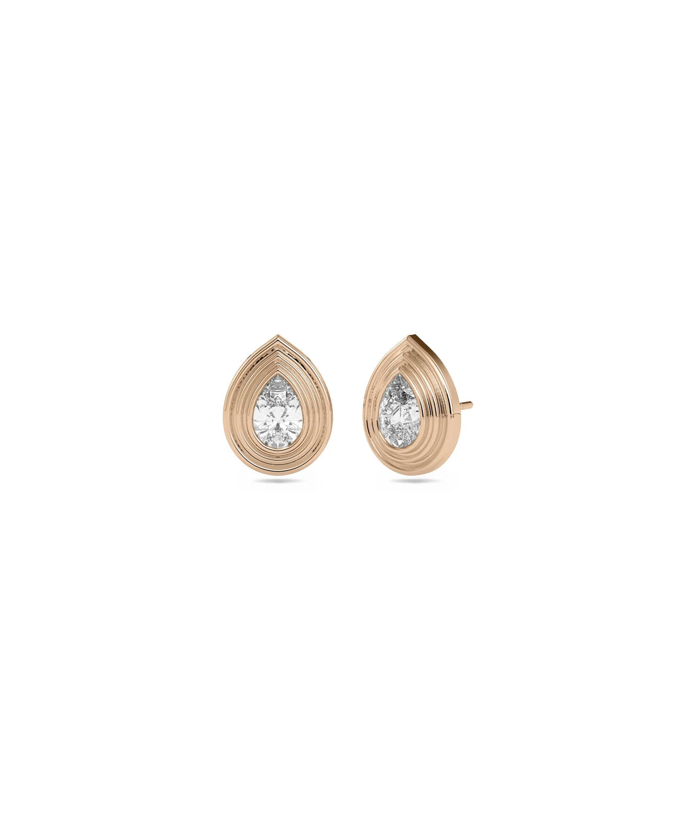 Rose gold solitaire studs featuring substantial 0.70 carat diamond brilliance sparkle