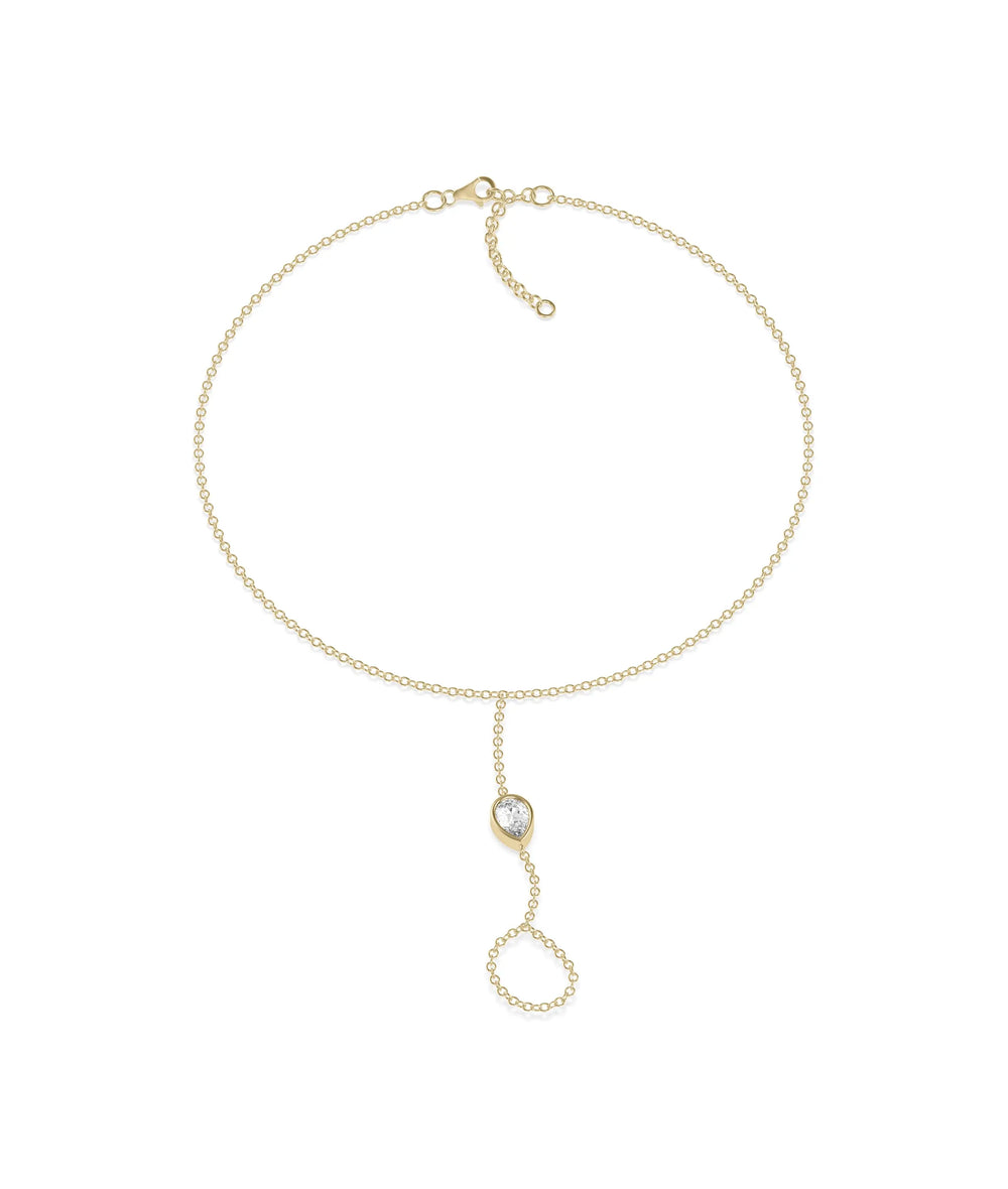 Diamond Solitaire Bezel Bracelet Ring in yellow gold with hand chain design