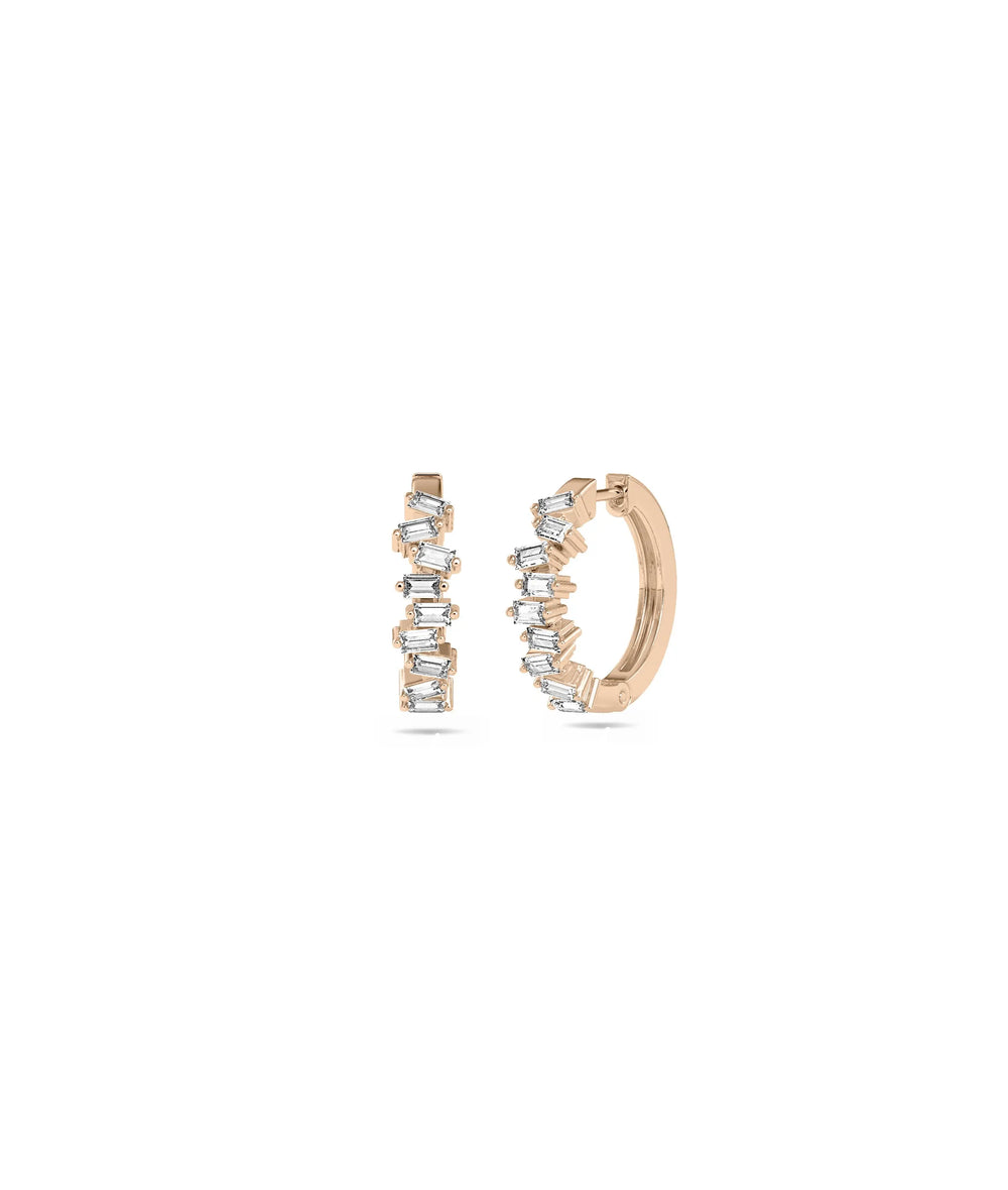 Rose gold baguette hoops featuring linear diamond arrangement and chic elegance