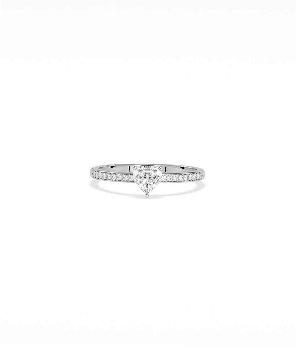 Diamond Solitaire and Pave Band Ring in white gold featuring solitaire sparkle