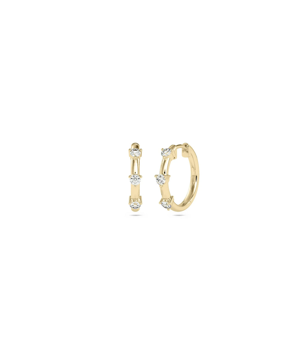 Diamond Station Hoop Earring in yellow gold with rhythmic evenly spaced diamond stations