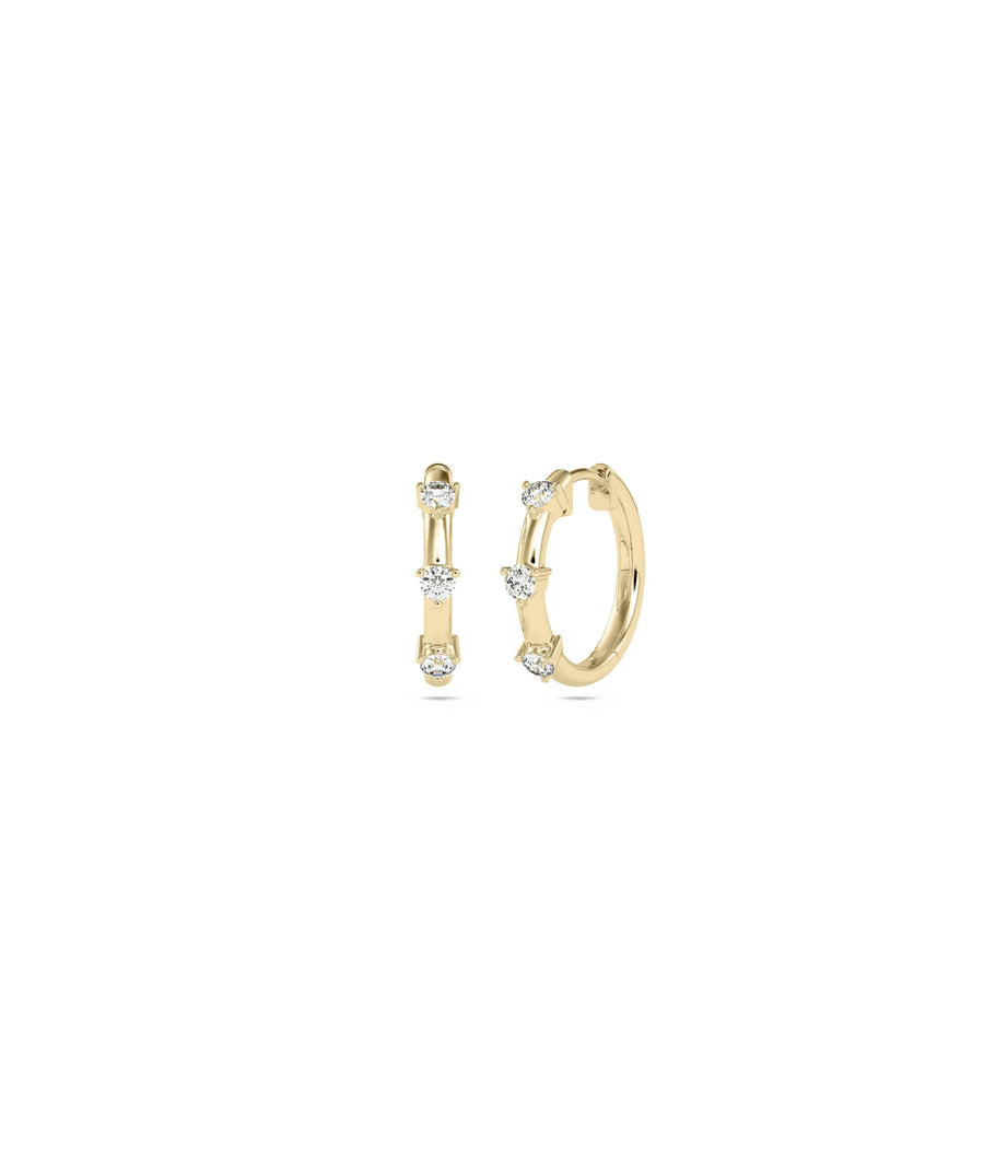 Diamond Station Hoop Earring in yellow gold with rhythmic evenly spaced diamond stations