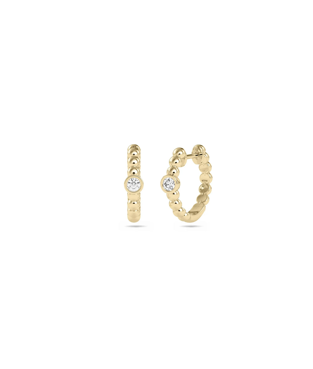 Diamond Bezel Set Solitaire Hoop Earring in yellow gold with bezel solitaire on classic hoop