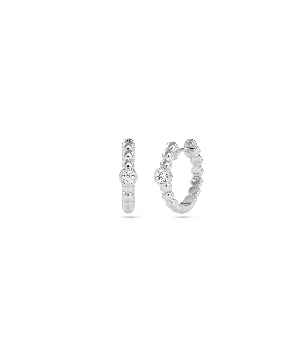 White gold Diamond Bezel Set Solitaire Hoop Earring featuring sleek bezel diamond setting