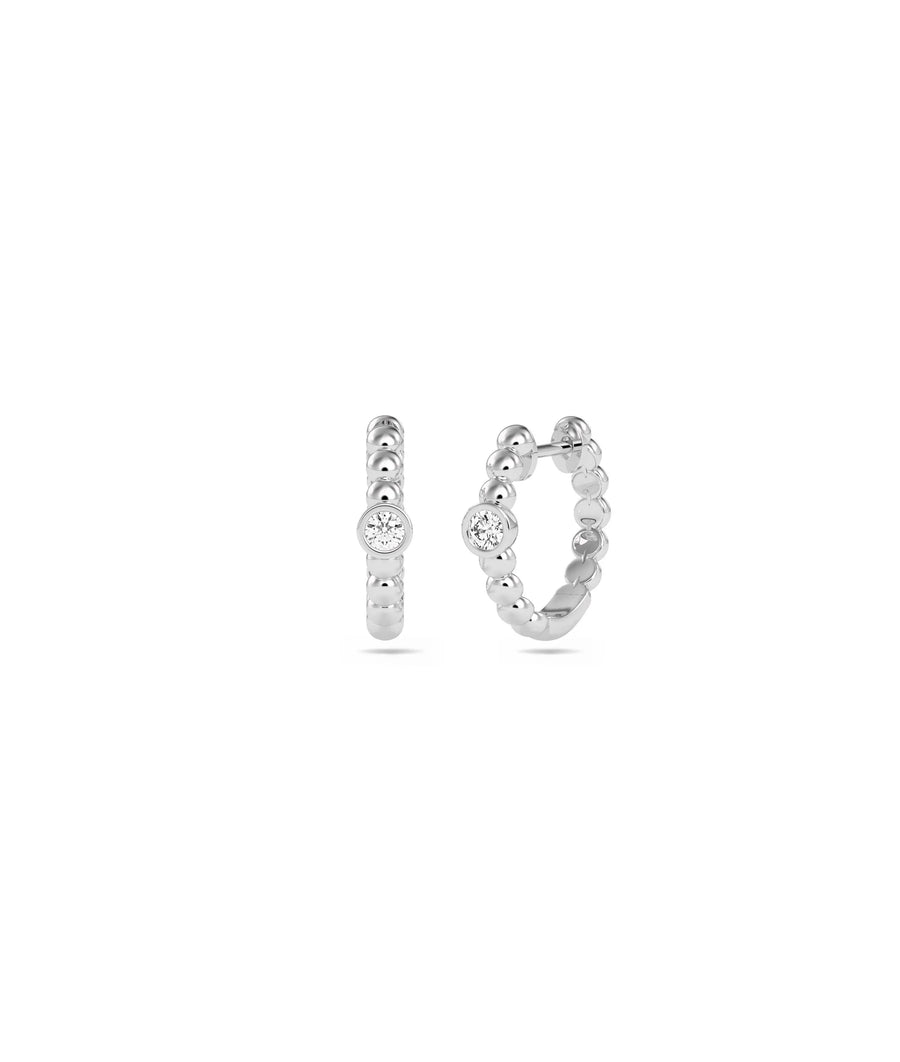 White gold Diamond Bezel Set Solitaire Hoop Earring featuring sleek bezel diamond setting