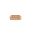 Rose gold fluted ring featuring classic band with modern textured twist