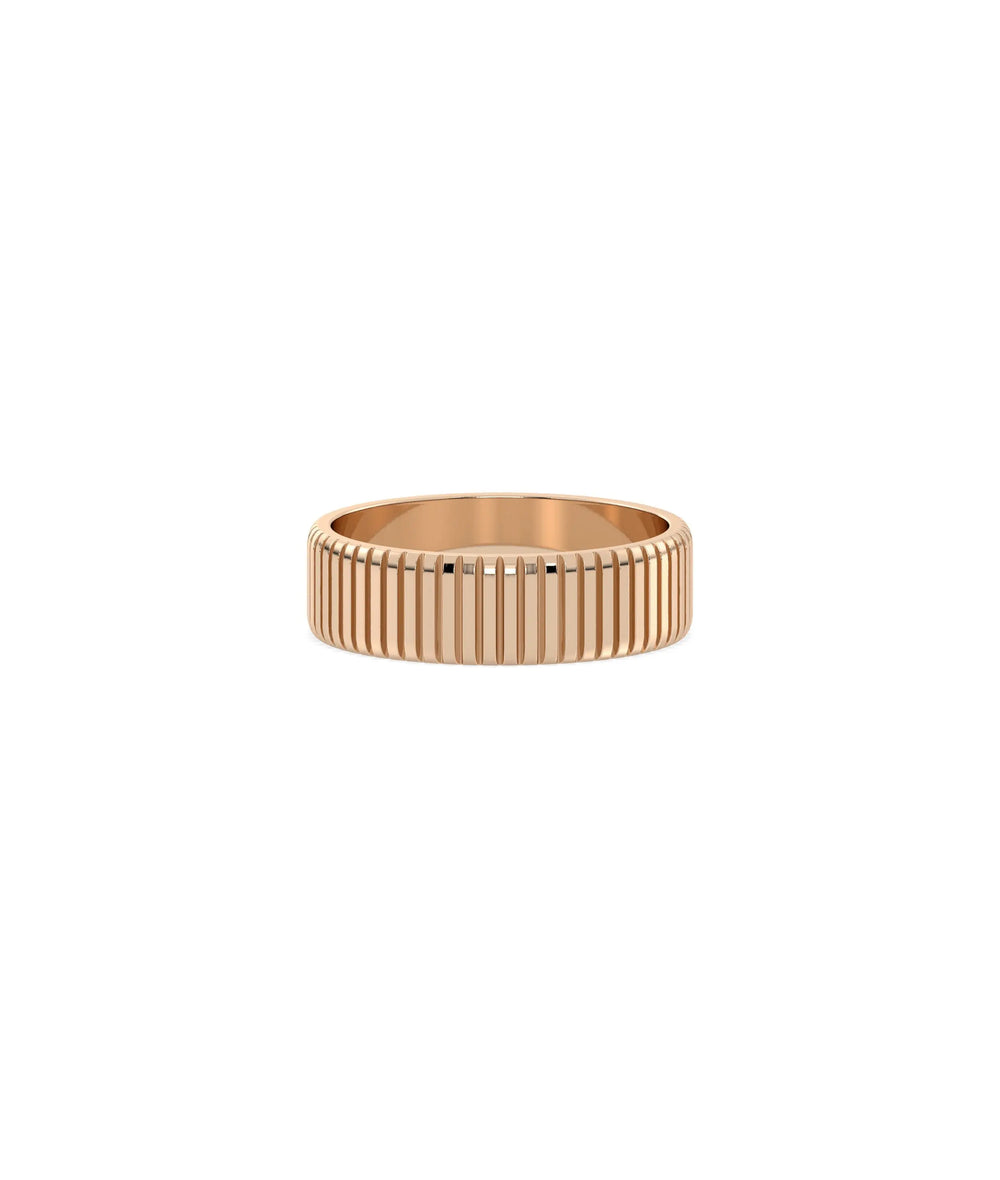 Rose gold fluted ring featuring classic band with modern textured twist