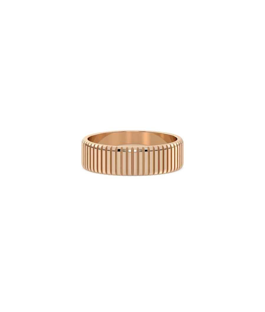 Rose gold fluted ring featuring classic band with modern textured twist