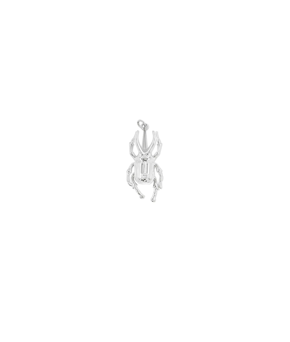 Gold Beetle Charm in white gold displaying intricate nature-inspired design