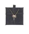 Palm Tree Necklace lifestyle photo with beach-inspired vacation vibes