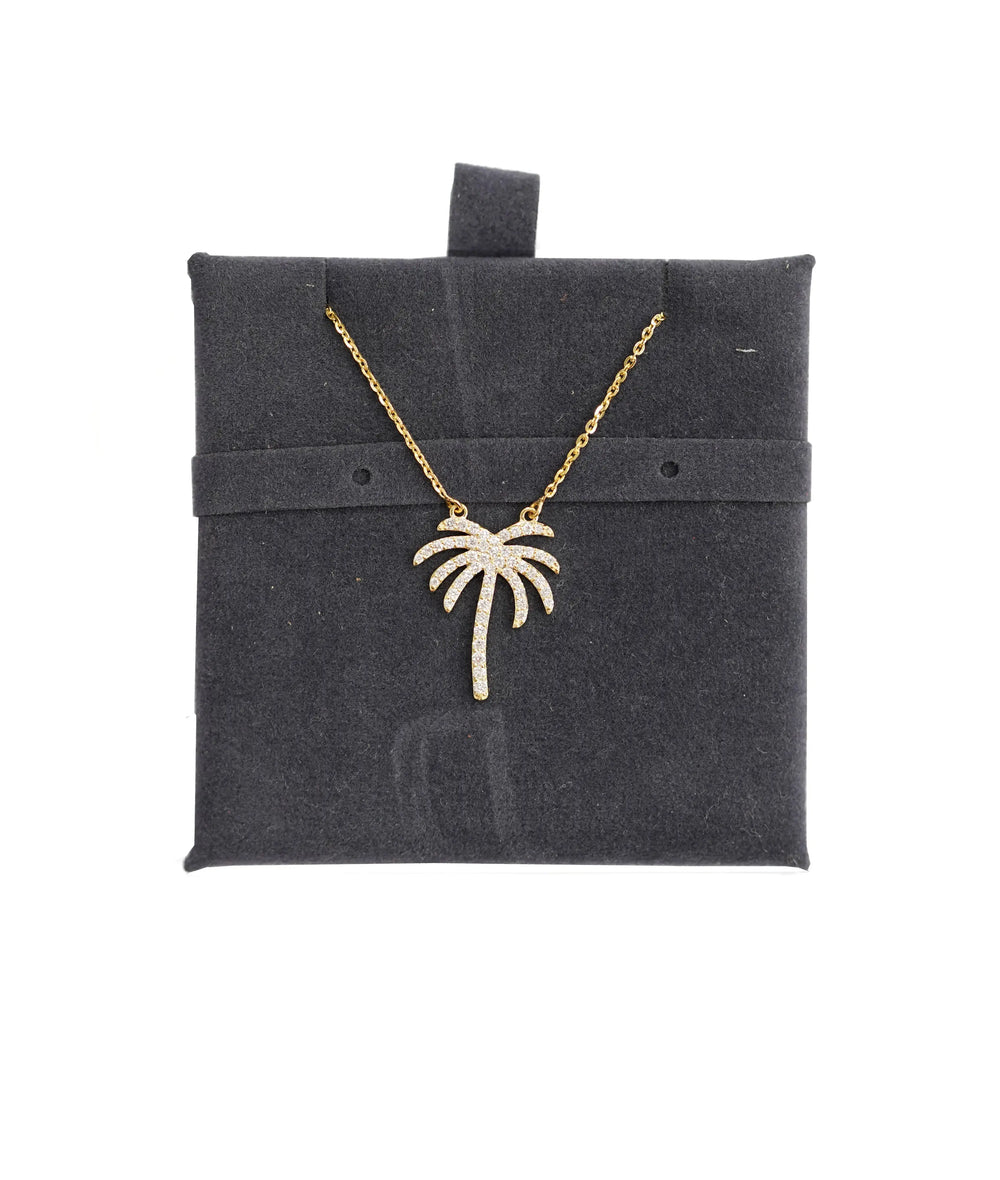 Palm Tree Necklace lifestyle photo with beach-inspired vacation vibes