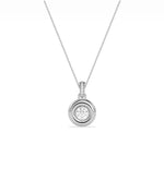 Gold bubble diamond charm worn on chain necklace elegant contemporary styling display