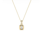 Bubble Solitaire Charm with diamond in bubble bezel setting diamond bail solid gold front