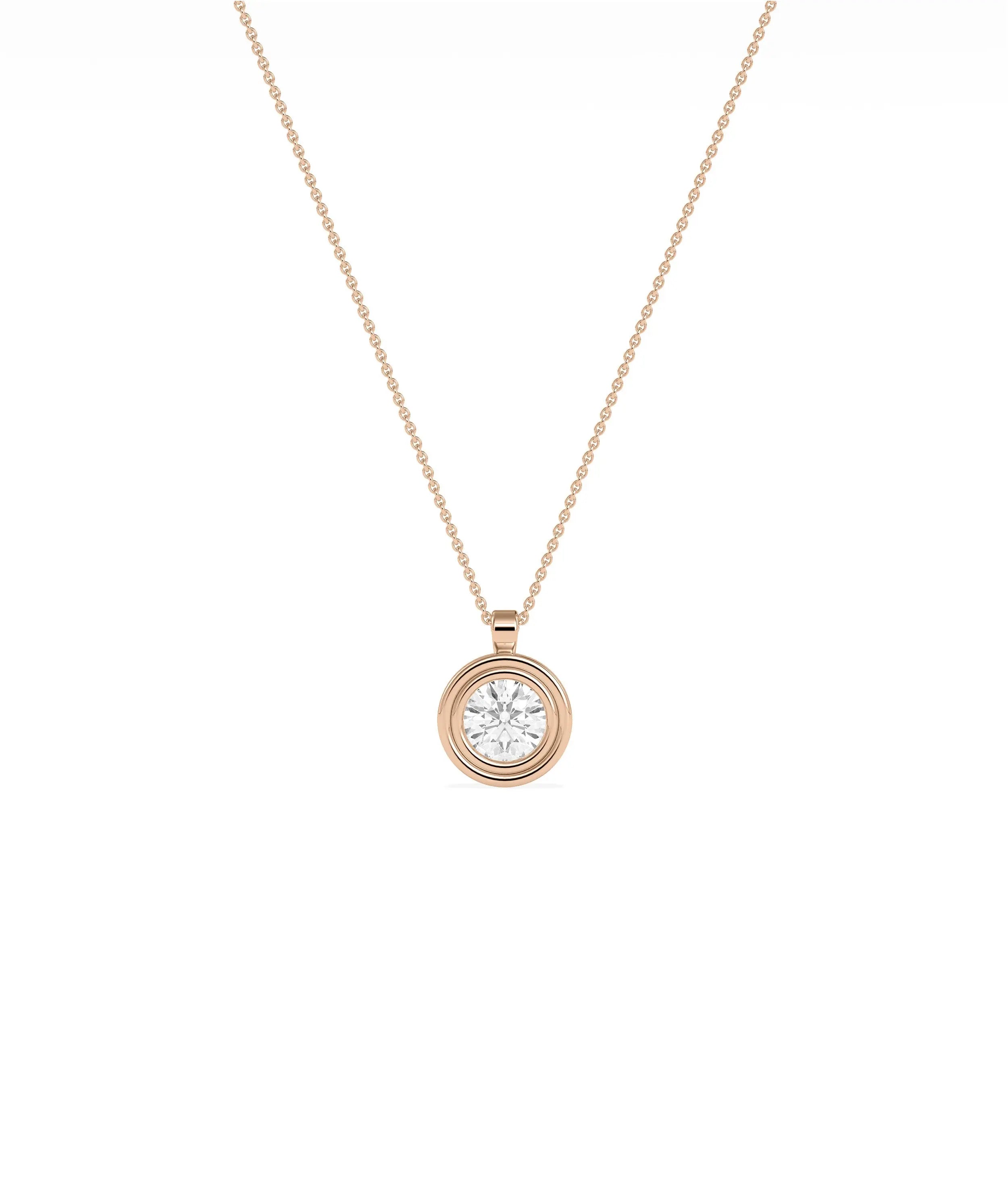 Gold double bezel diamond charm side view highlighting two layer construction and depth