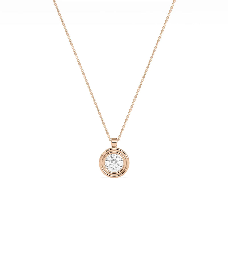 Gold double bezel diamond charm side view highlighting two layer construction and depth