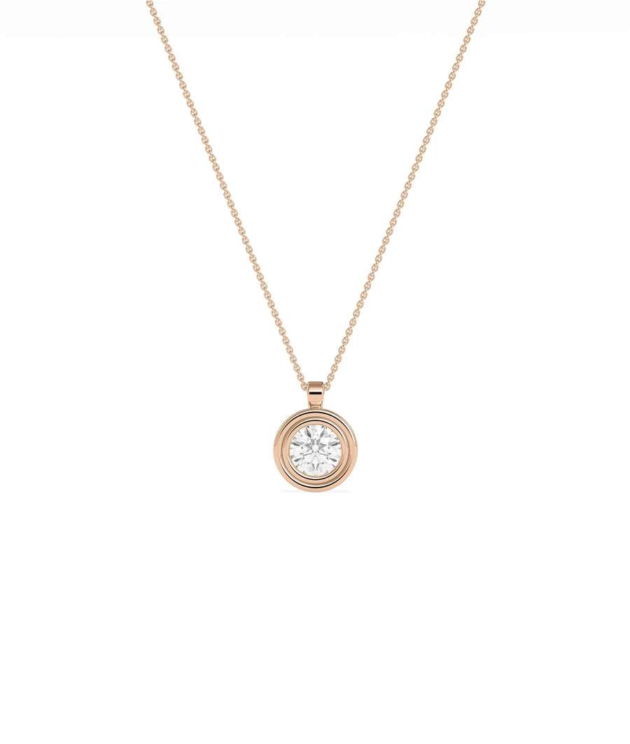 Gold double bezel diamond charm side view highlighting two layer construction and depth