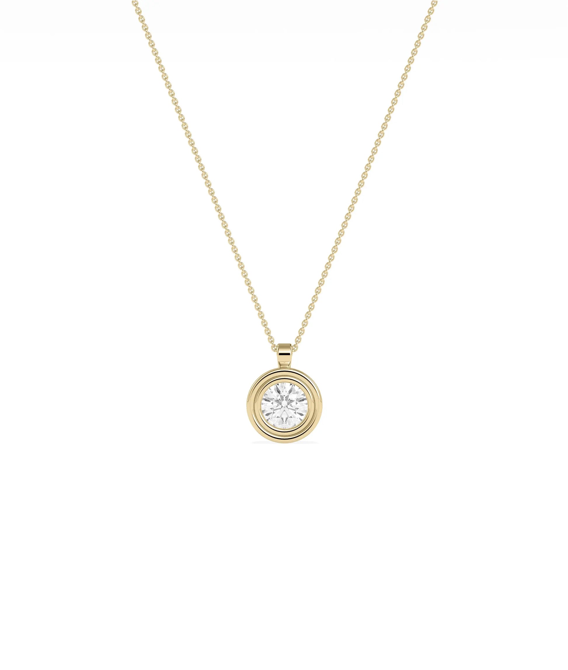 Layered bezel diamond charm solid gold concentric design closeup showing dimensional depth