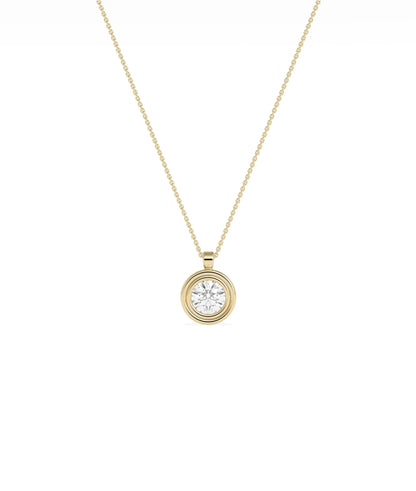 Layered bezel diamond charm solid gold concentric design closeup showing dimensional depth
