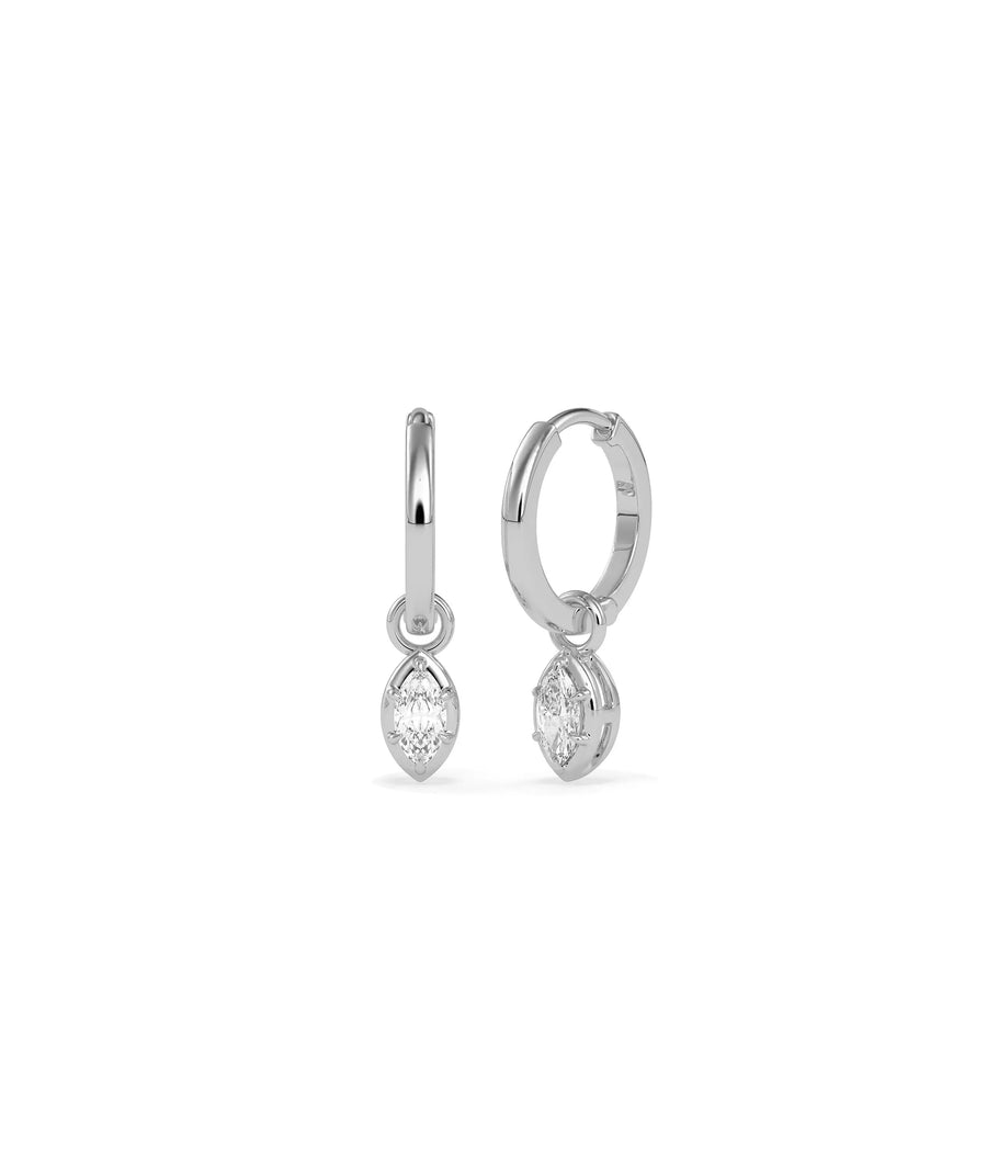 Gold bezel diamond dangle earrings profile showing secure setting and sparkle detail