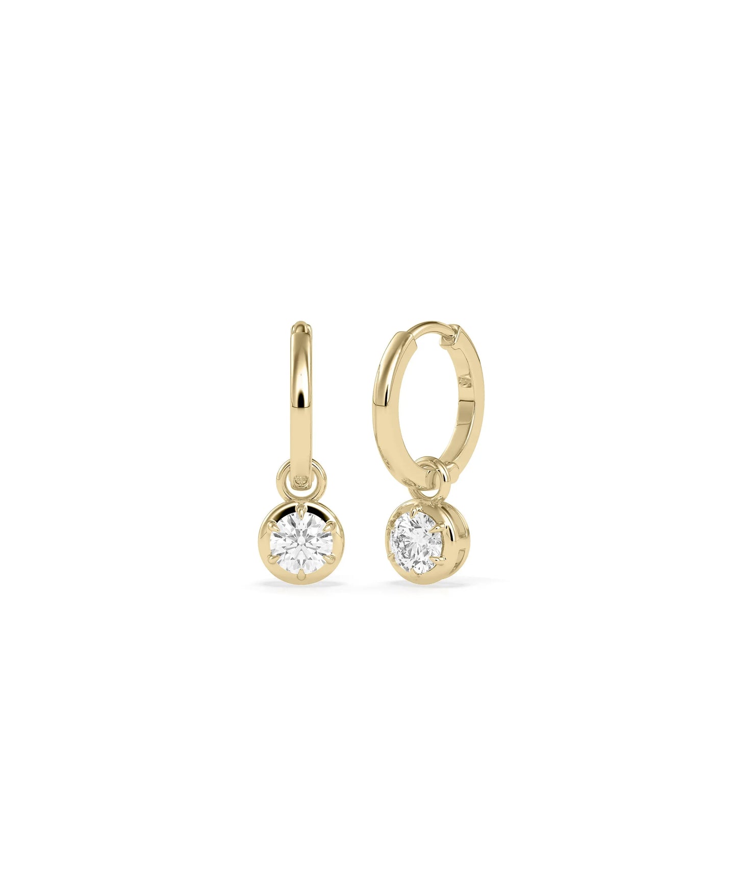 Diamond dangle earrings bezel set design solid gold protective settings closeup detail
