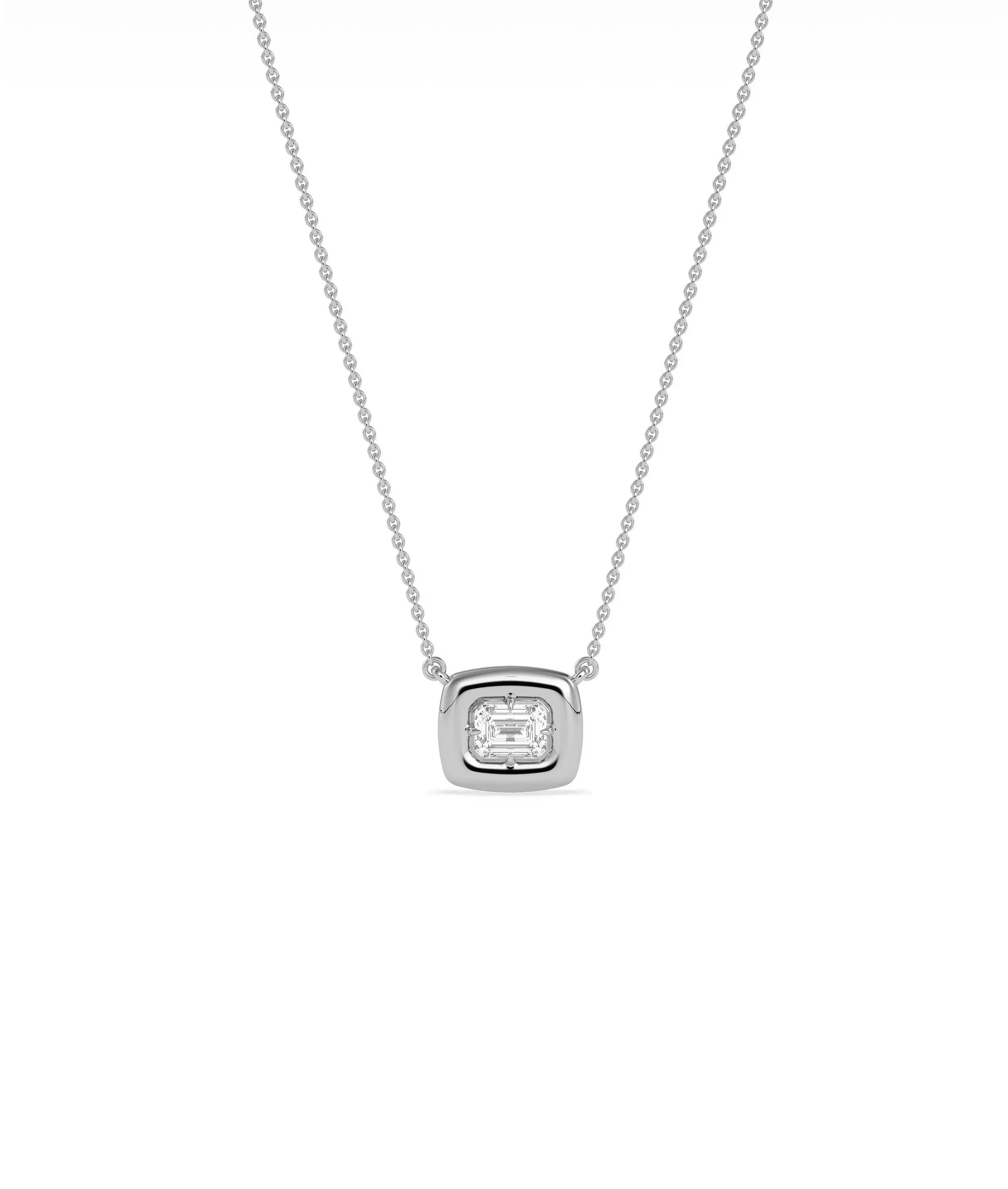 Gold solitaire diamond necklace bubble bezel worn on neckline elegant everyday style