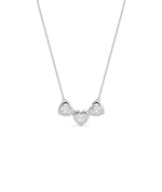 Three heart diamond necklace bubble bezel settings solid gold chain closeup detail