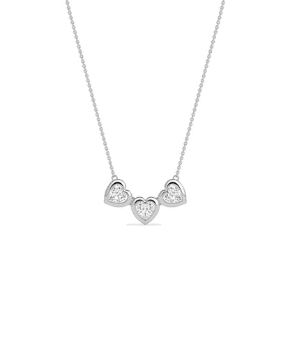 Three heart diamond necklace bubble bezel settings solid gold chain closeup detail