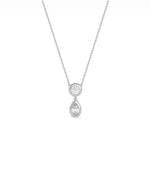 Two stone bezel pendant showing smooth protective settings and arrangement